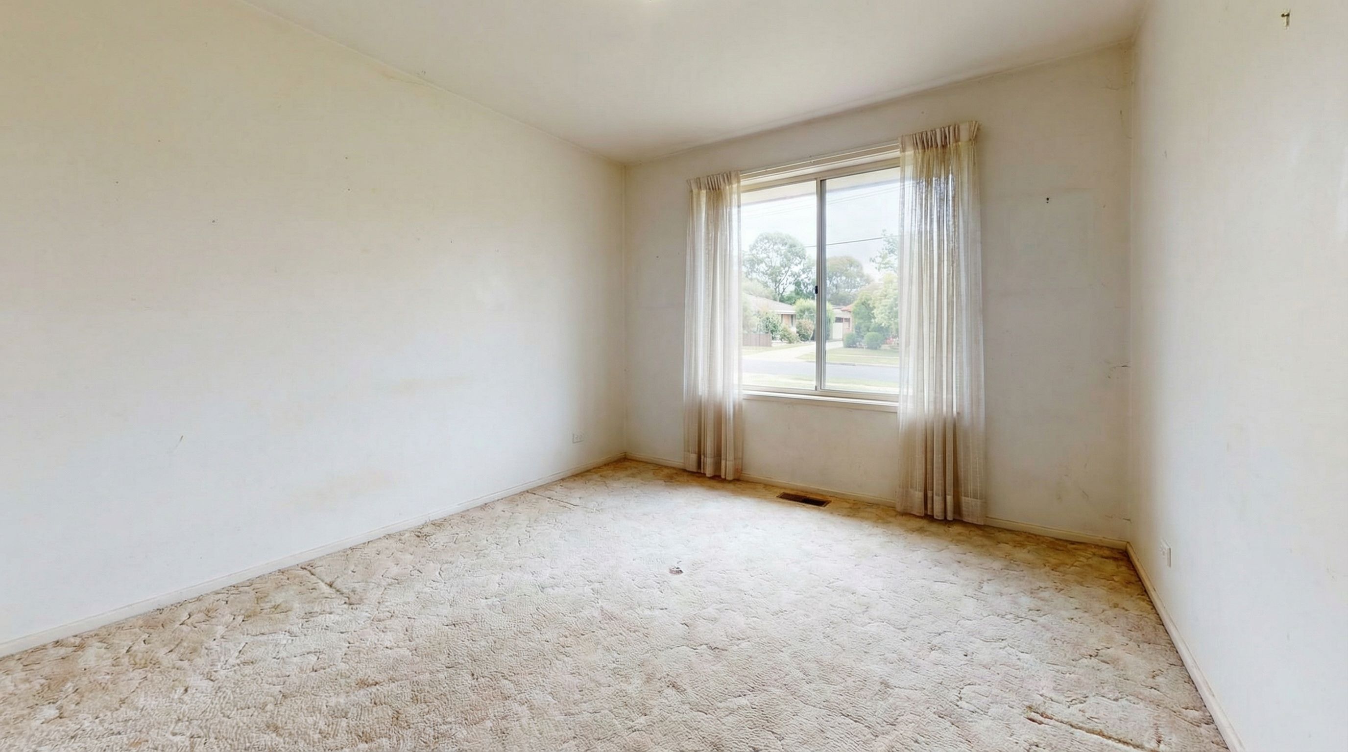 Empty bedroom before transformation